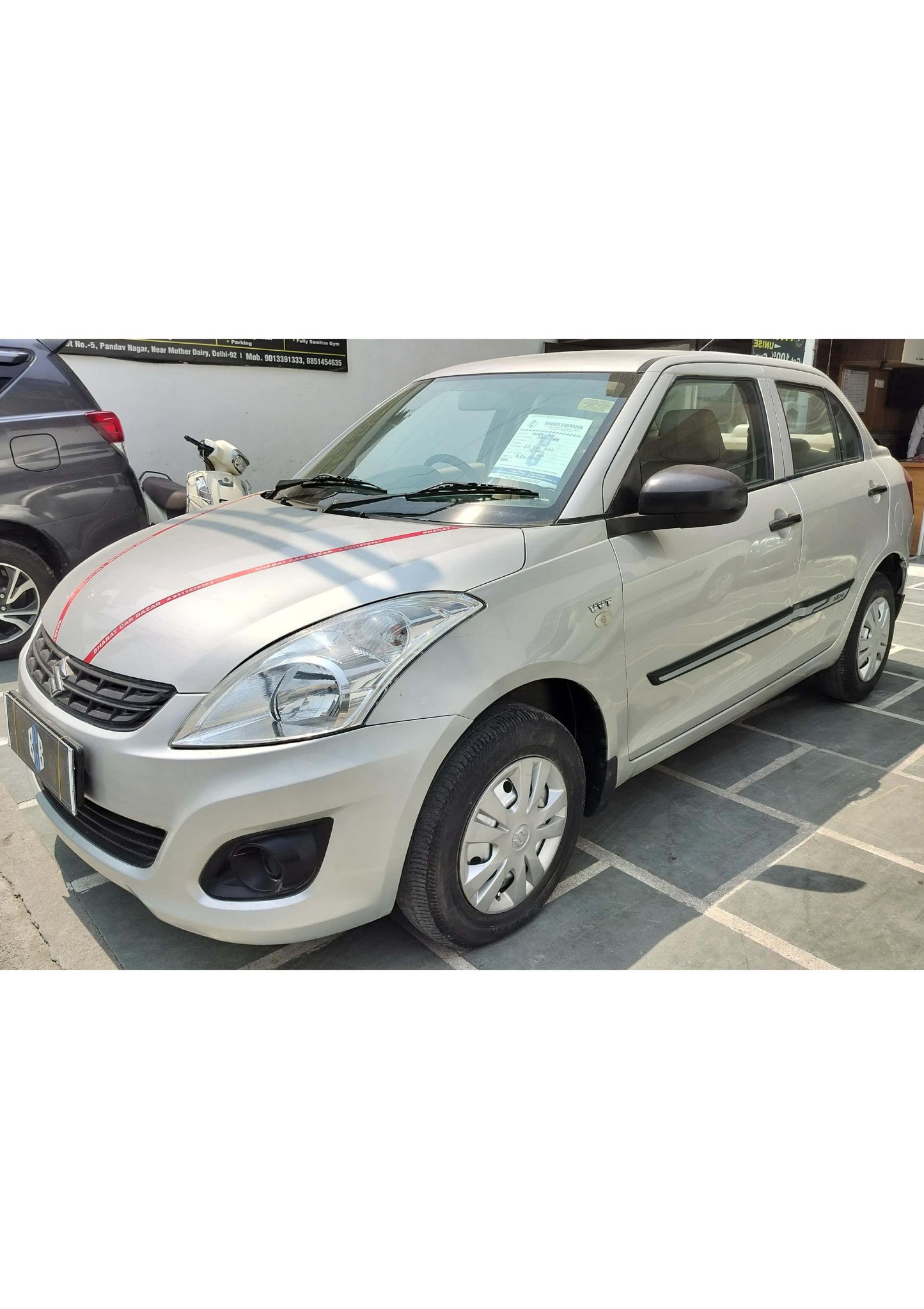 33,000 KMS DZIRE LXI PETROL (2013)