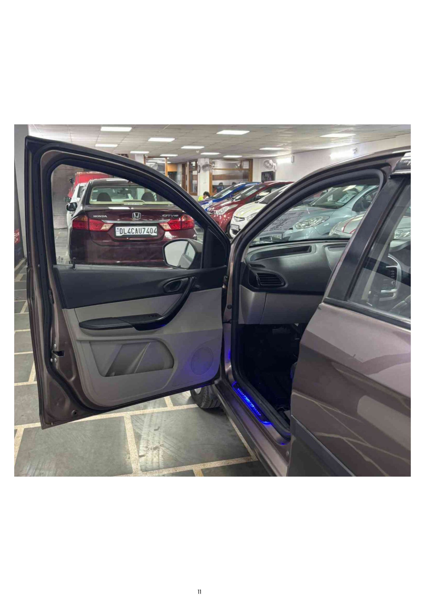 10,000 KMS TATA TIAGO XT (O) PETROL (2016)