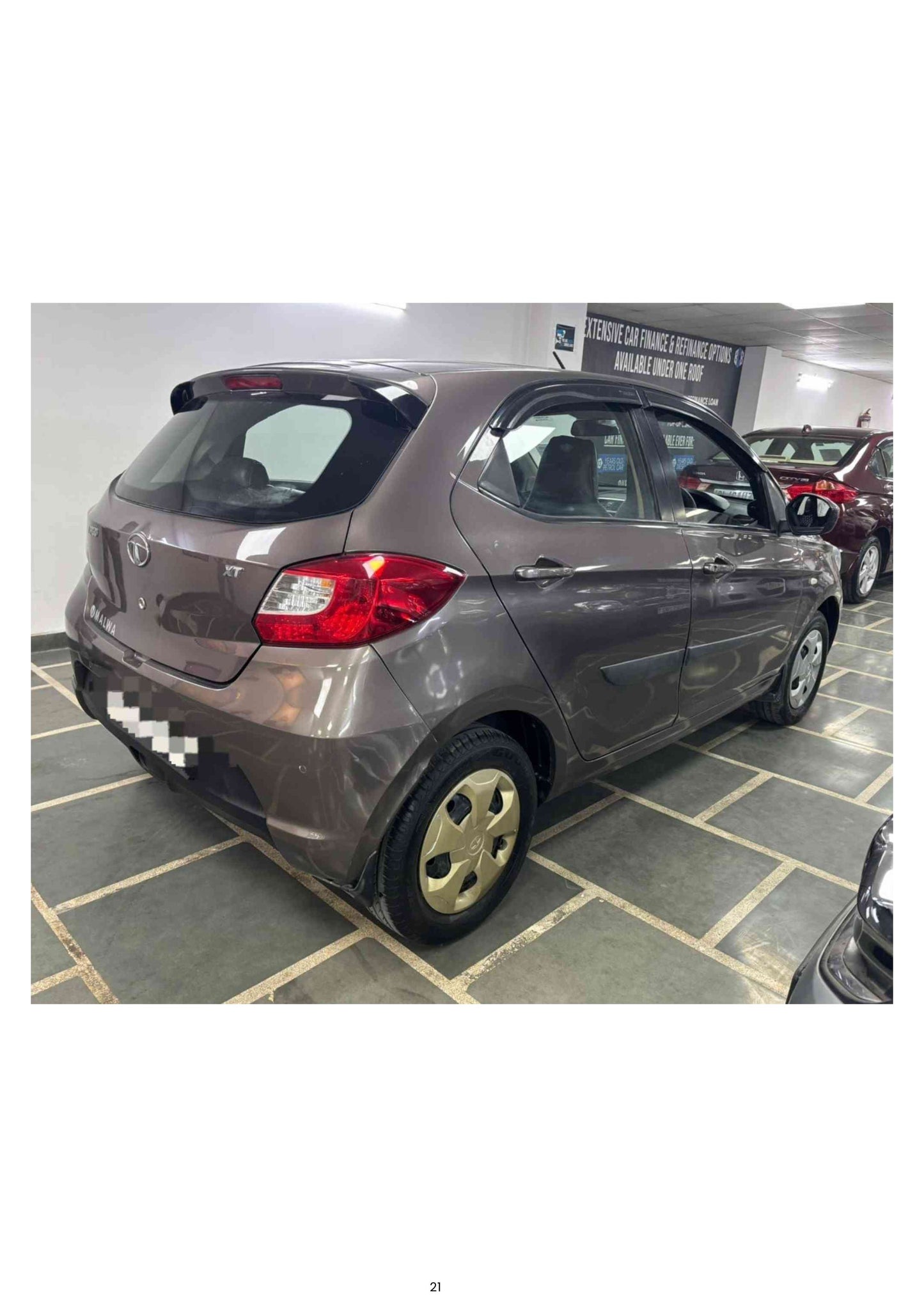 10,000 KMS TATA TIAGO XT (O) PETROL (2016)