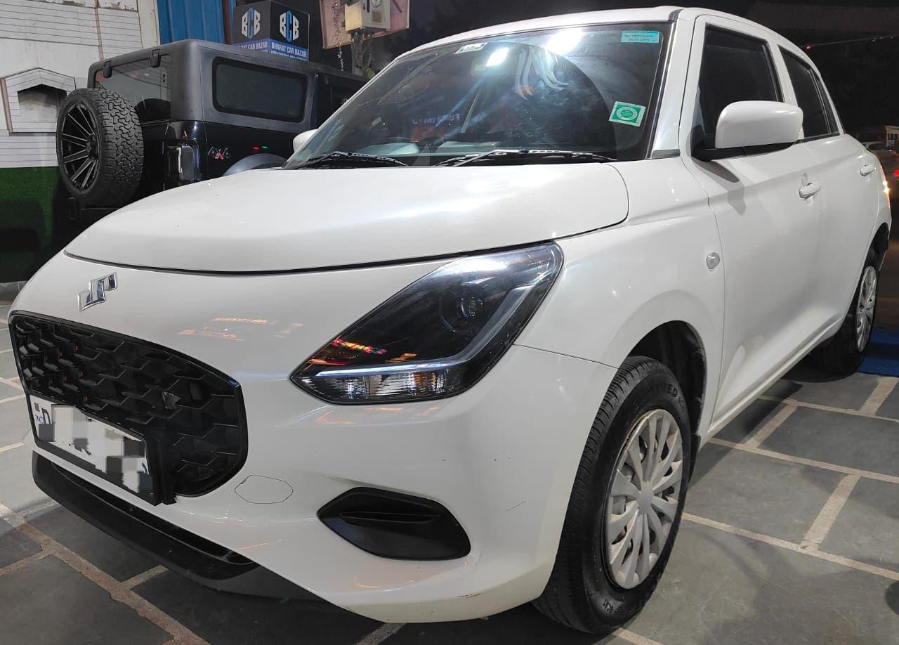 12,000 KMS MARUTI SWIFT LXI PETROL (2024)