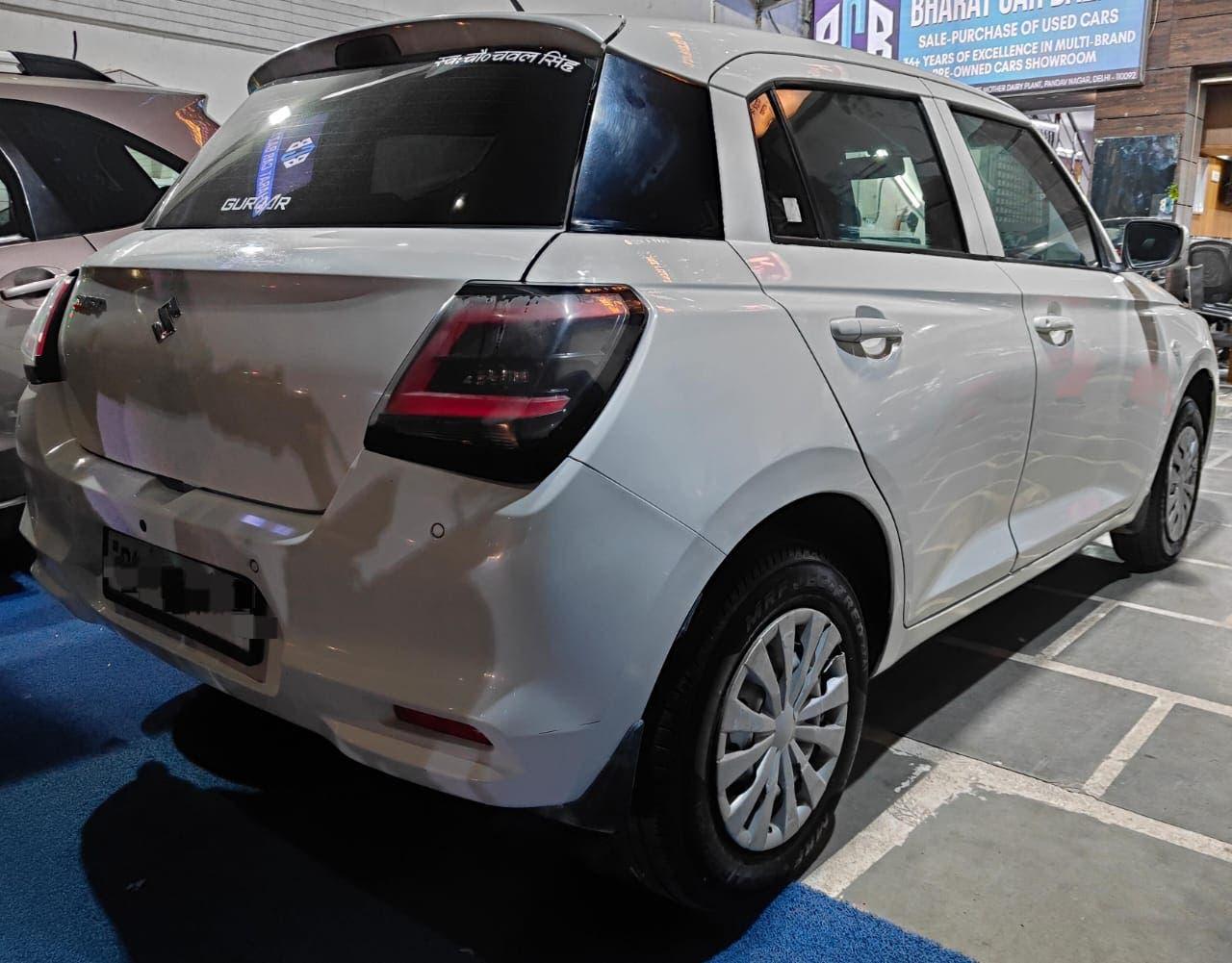 12,000 KMS MARUTI SWIFT LXI PETROL (2024)