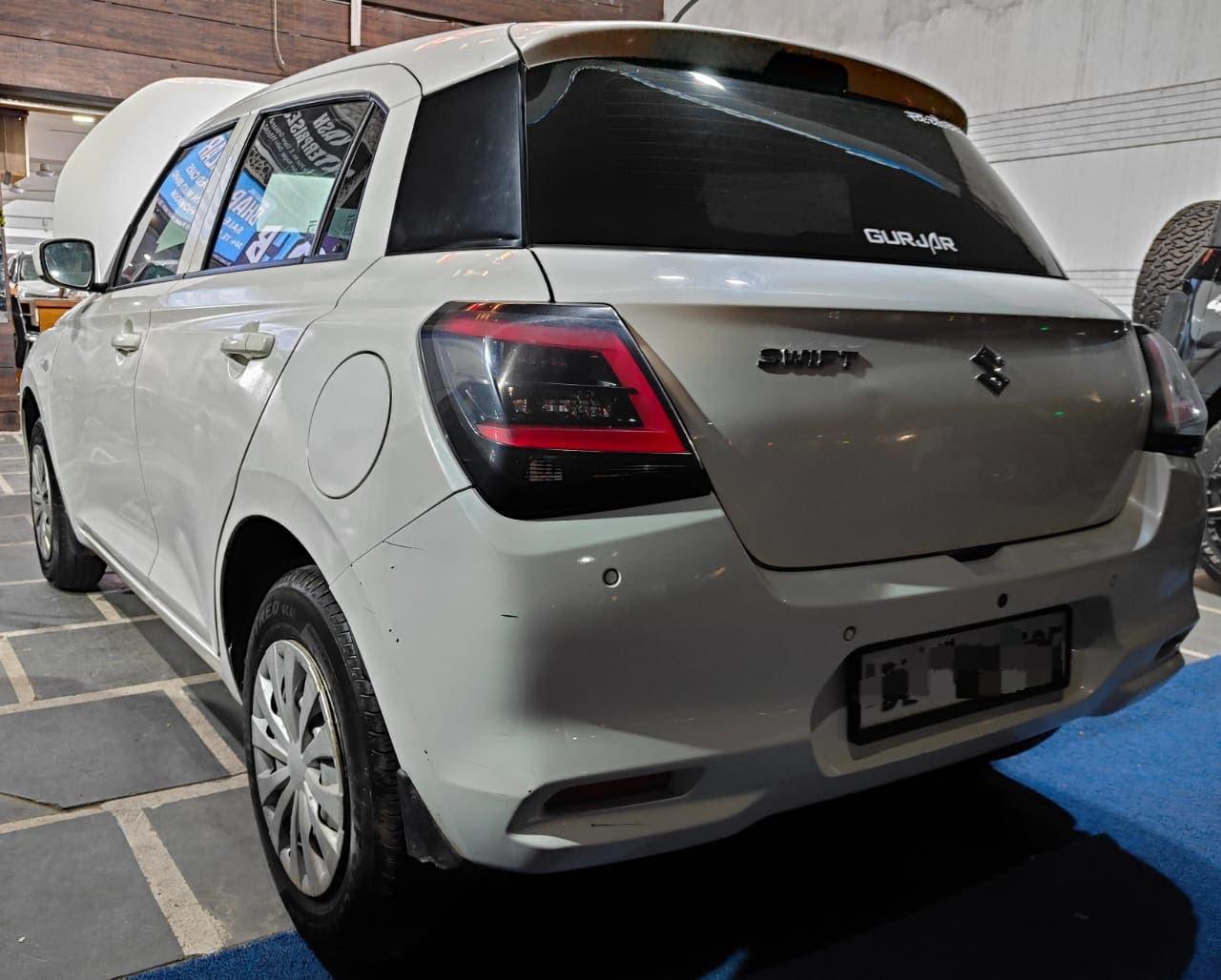 12,000 KMS MARUTI SWIFT LXI PETROL (2024)