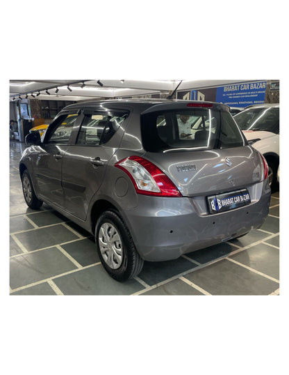 12,000 KMS MARUTI SWIFT LXI (O) 1.2 PETROL (2017)