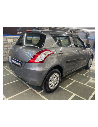 12,000 KMS MARUTI SWIFT LXI (O) 1.2 PETROL (2017)