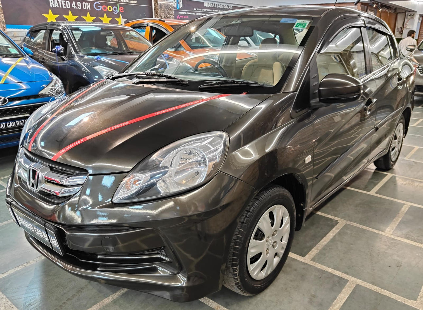 23,000 KMS HONDA AMAZE 1.2 S MT PETROL (2016)