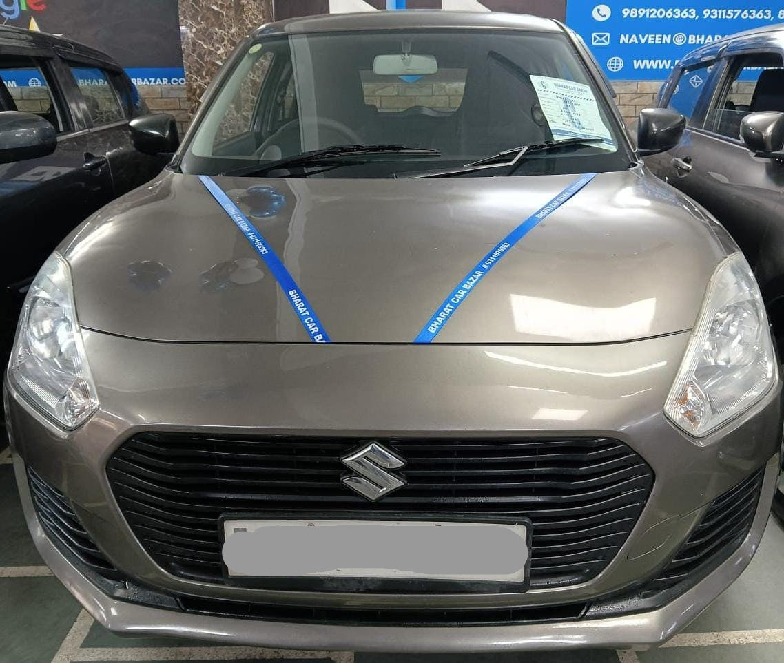 27,000 KMS MARUTI SWIFT LXI PETROL (2018)