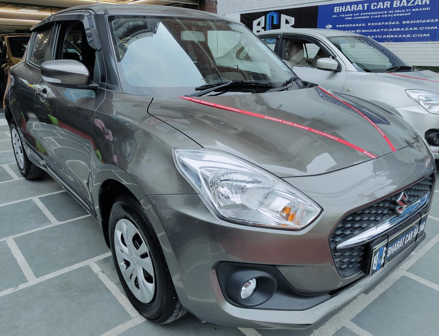 11,000 KMS MARUTI SWIFT VXI PETROL (2024)