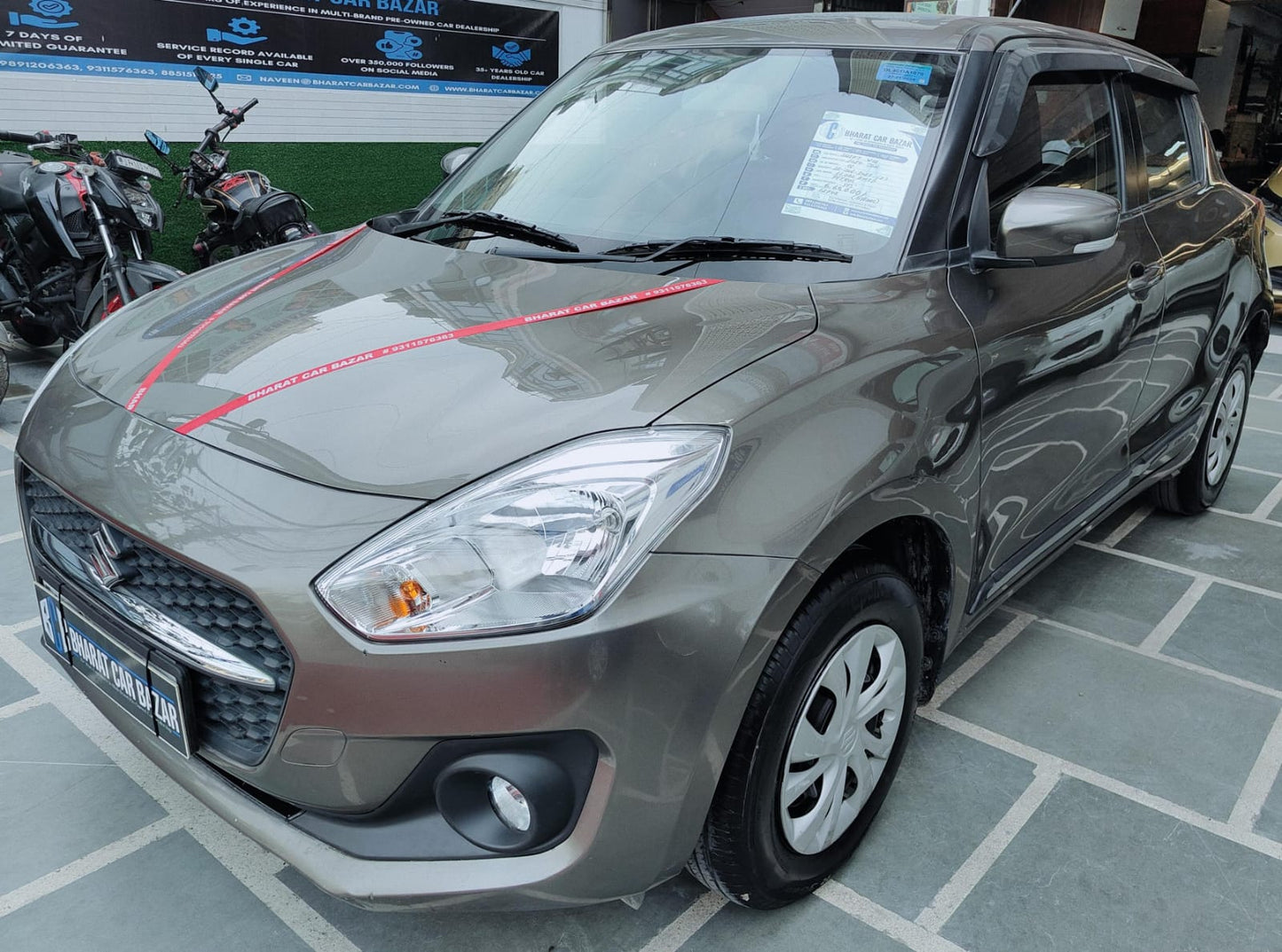 11,000 KMS MARUTI SWIFT VXI PETROL (2024)
