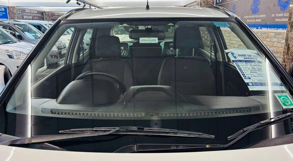 12,000 KMS MARUTI BREZZA VXI (O) PETROL (2022)