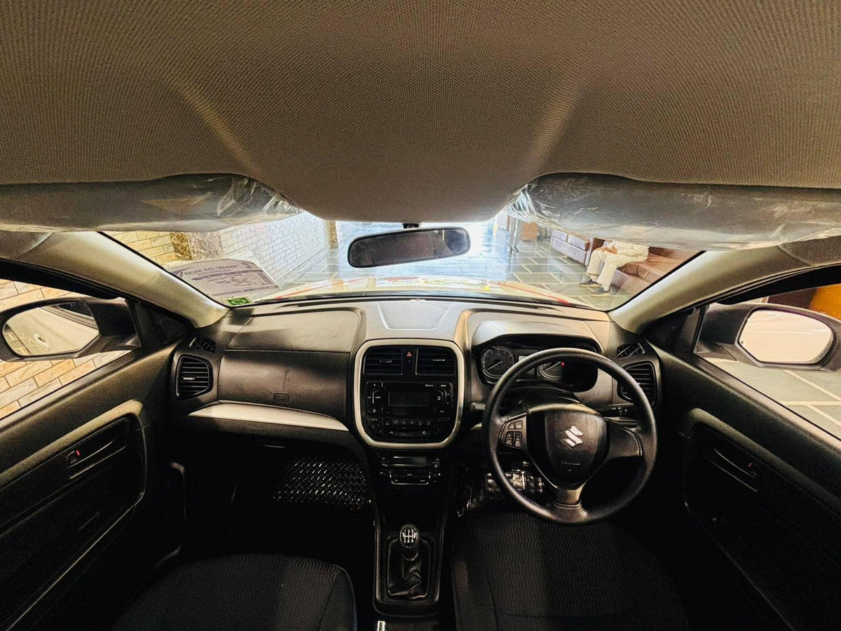 12,000 KMS MARUTI BREZZA VXI (O) PETROL (2022)