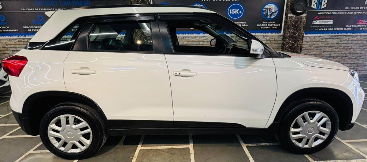 12,000 KMS MARUTI BREZZA VXI (O) PETROL (2022)