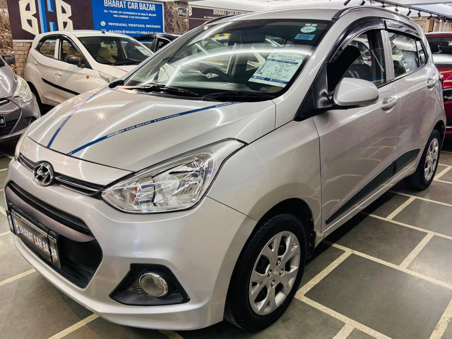 12,000 KMS HYUNDAI GRAND I10 1.2 SPORTZ (2016)