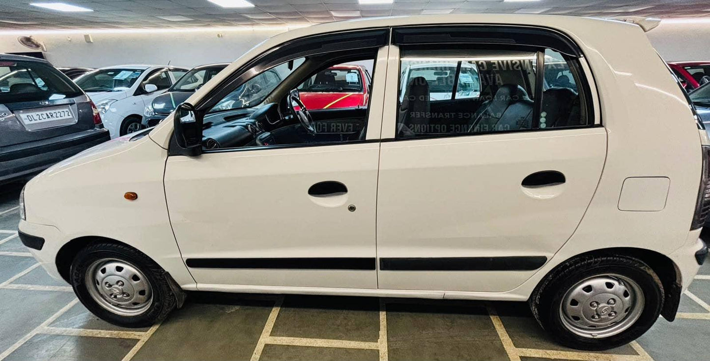 9,000 KMS HYUNDAI SANTRO GL PETROL (2014)