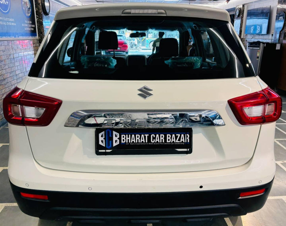 12,000 KMS MARUTI BREZZA VXI (O) PETROL (2022)