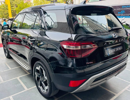 39,000 KMS HYUNDAI ALCAZAR SIGNATURE (O) 6 STR 1.5 DCT PETROL (2023)