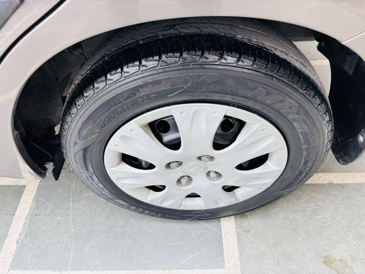 23,000 KMS HONDA AMAZE 1.2 S MT PETROL (2014)